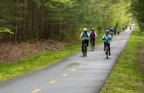 riders and walkers on the rail trail in Mattapoisett