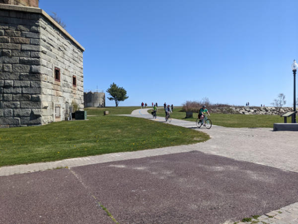Cyclists on bike path at old military fort